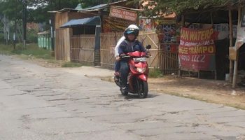jalan bebelan rusak_foto poskota
